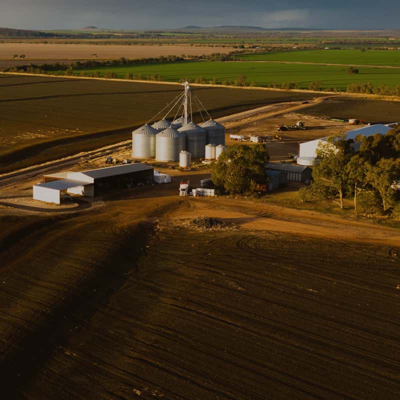 Bellata Gold farm and silos aerial view at dusk