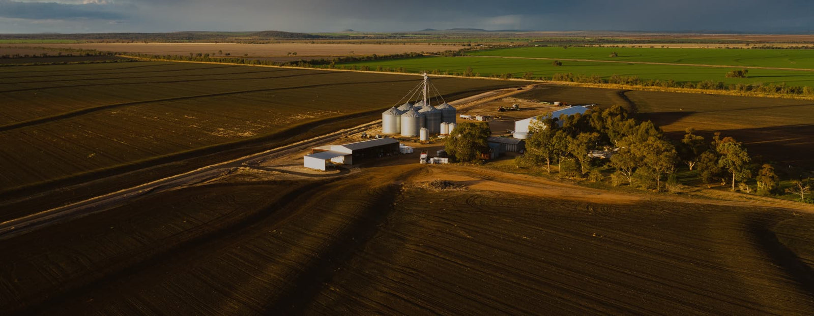 Bellata Gold farm and silos aerial view at dusk